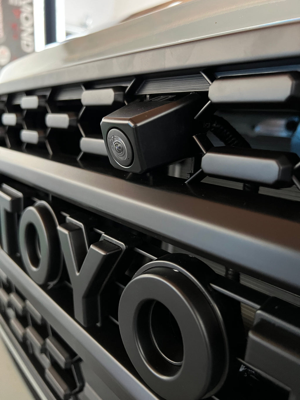 Front OEM Camera Mounting Bracket for Aftermarket TRD Pro Grille 2020 - 2023 Toyota Tacoma.
